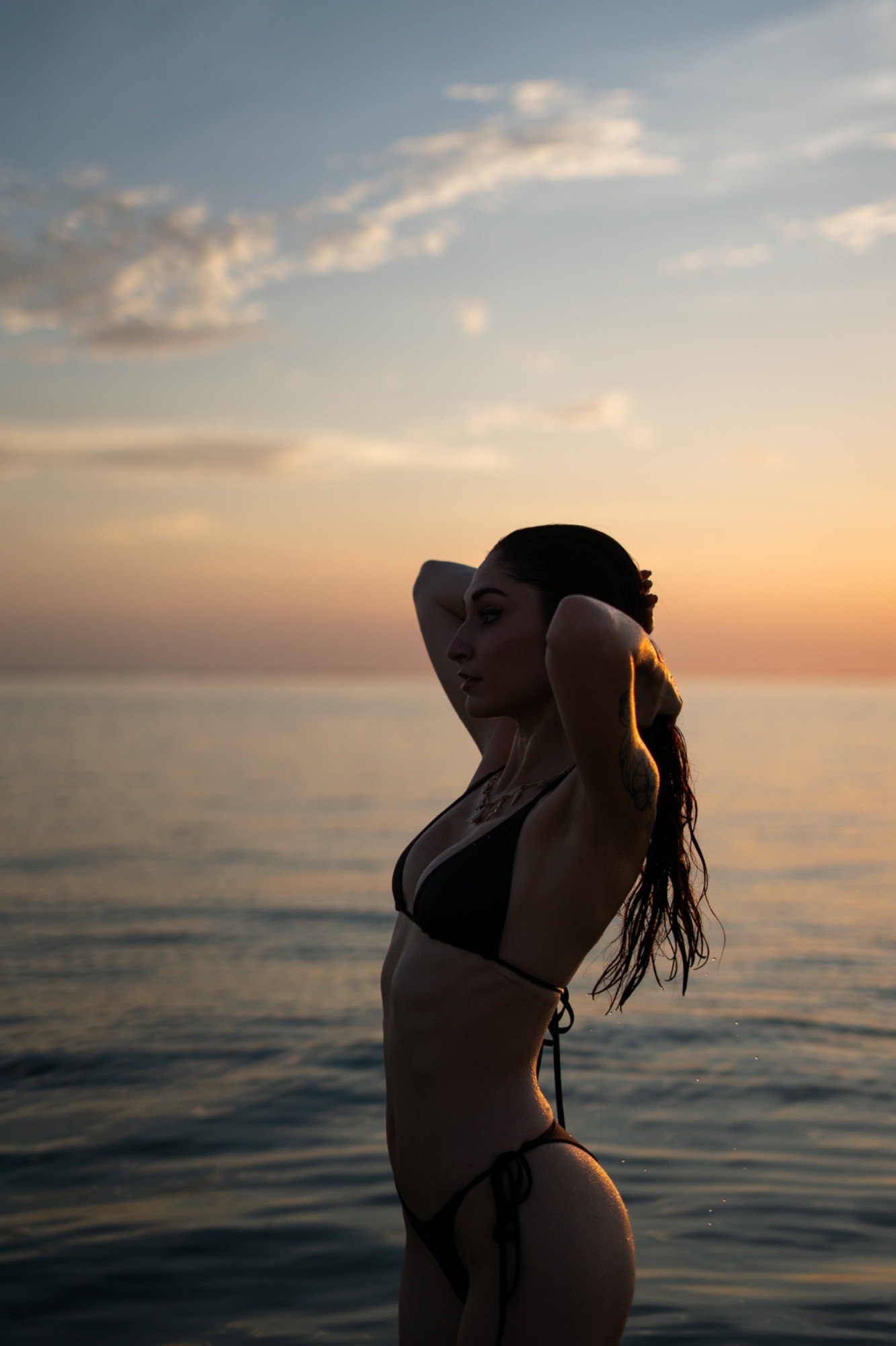 A sunset portrait with windblown hair